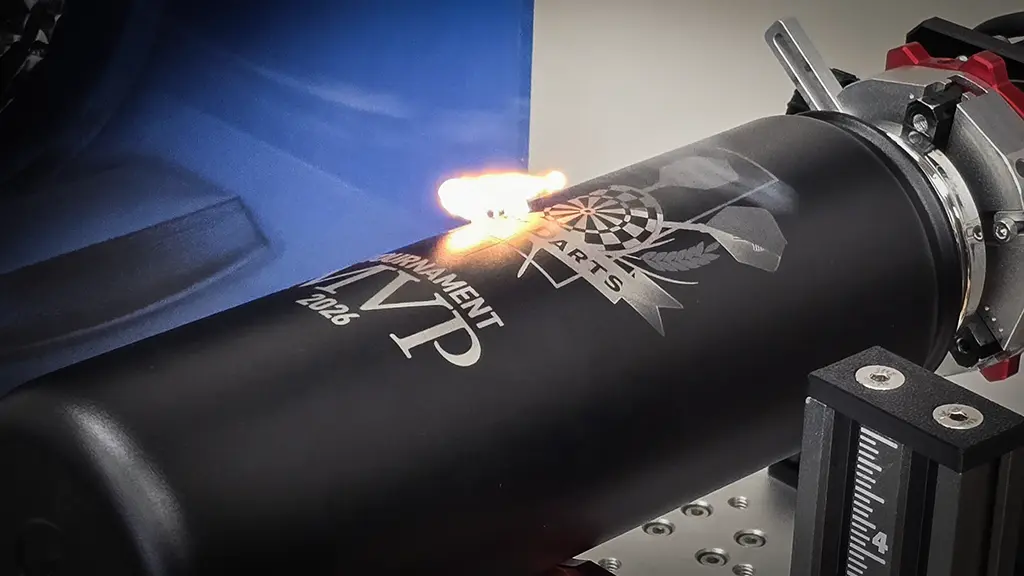 Laser engraving machine engraving a stainless steel tumbler in Saskatoon