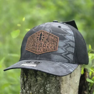 Richardson Kryptek camo snapback hat with engraved genuine leather Lime Tree logo patch and half-toned gravel texture design.