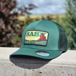 Green Saskatchewan trucker hat with 7-colour grain elevator prairie sunset patch