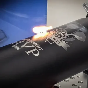 Laser engraving machine engraving a stainless steel tumbler in Saskatoon